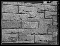Texture background for motion picture and filmstrip titles. Stone wall. Sourced from the Library of Congress.