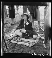 A big day, Mama: Easter bunnies, cherry blossoms and picture taking. Cherry Blossom Festival, Washington, D.C.. Sourced from the Library of Congress.