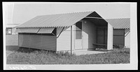 Prefabricated steel shelter, one-family unit, to replace tents in Farm Security Administration camps for migratory farm workers. Sourced from the Library of Congress.