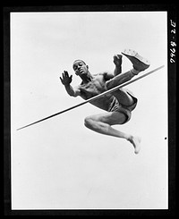 [Untitled photo shows: Cornelius Johnson, winner of the gold medal at the 1936 Olympics, in a high jump ]. Sourced from the Library of Congress.