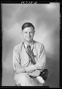 [Untitled photo, possibly related to: Portrait of Russell Lee, FSA (Farm Security Administration) photographer]. Sourced from the Library of Congress.