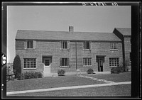 Completed brick-veneer row house at Greenbelt, Maryland. Sourced from the Library of Congress.