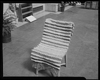 Washington, D.C. Exhibition of textiles produced by Work Projects Administration weaving projects in Kentucky and Tennessee, held in the courtyard of the United States Department of Agriculture building. Sourced from the Library of Congress.