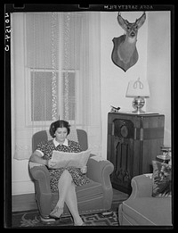 Lititz (vicinity), Lancaster County, Pennsylvania. Mrs. Paul Minnich in her living room on the farm of her father-in-law, C.F. Minnich. Sourced from the Library of Congress.