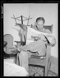 Thomas Evans, a FSA (Farm Security Administration) client, waiting for dinner. Barto, Berks County, Pennsylvania. Sourced from the Library of Congress.