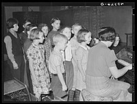 Lancaster County, Pennsylvania. The children in Martha Royer's school singing the "Star Spangled Banner." Notice the Amish boy on the extreme left. Sourced from the Library of Congress.