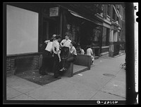 New York, New York. 1938. A group of boys on East 62nd (or 63rd) Street. Sourced from the Library of Congress.