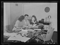 [Untitled photo, possibly related to: Washington, D.C. Foreign students at the international student assembly recording short talks in their native language to be broadcast by shortwave, after censorship by the Office of War Information (OWI), to Nazi-held territory. French group preparing speeches for broadcast. Left to right Doris Koren, Lucky Baum, Francoise Benoit Levy]. Sourced from the Library of Congress.
