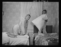 Rochester, New York. The two Babcock boys having a little fun before going to sleep. Sourced from the Library of Congress.