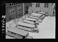 [Untitled photo, possibly related to: Keysville, Virginia. Randolph Henry High School. Buses bring students from miles around as the school covers an area of 496 square miles. Some children come as far as thirty miles to school in one of the seventeen buses, some of whcih are driven by seniors]. Sourced from the Library of Congress.