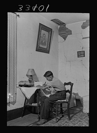 [Untitled photo, possibly related to: Keysville, Virginia. Randolph Henry High School. One of the students studying at home]. Sourced from the Library of Congress.