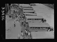 [Untitled photo, possibly related to: Keysville, Virginia. Randolph Henry High School. Buses bring children from miles around as the school covers an area of 496 square miles. Some children come as many as thirty miles to school in one or the other of the seventeen buses, some of which are driven by seniors]. Sourced from the Library of Congress.