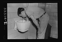 Keysville, Virginia. Randolph Henry High School. Boy at the drinking fountain. Sourced from the Library of Congress.