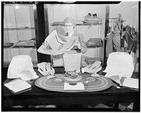 New York, New York. Miss Kanner, one of the members of the staff, showing the handiwork of the Lighthouse, an institution for the blind, at 111 East Fifty-ninth Street. Sourced from the Library of Congress.