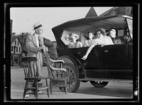 The Hardwick Victory Store is back in operation and scenes like this are again being witnessed daily. This picture shows a typical transaction of business: Raymond Duby, in buggy, buying a commode. George Slayton and Guy Larabee lend a hand loading the furniture. Sourced from the Library of Congress.