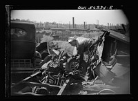 Manayunk, Pennsylvania. Workmen in an automobile junk yard on Ridge Avenue. Sourced from the Library of Congress.