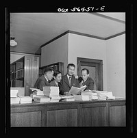 Chinese technical experts (social welfare) in University of Maryland library where they are taking training course given by UNRRA (United Nations Relief and Rehabilitation Administration). From left: Pei-chien Sun, Chi Kuo, Rao-ku Cheng, and Chung-chang Yang. Sourced from the Library of Congress.