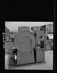 Laundry unit for small detachments. Weights 2,465 pounds, will clean and dry 40 pounds of laundry per hour and will serve up to 600 men. Shown at demonstration held by United States Army Air Forces. Sourced from the Library of Congress.