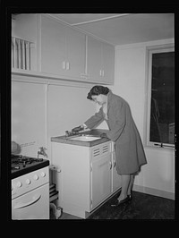 Houses for Britain. Detail of sink nad cupboards in kitchen of prefabricated model house erected by the Federal Public Housing Authority at Scott Circle, Washington, D.C. of the type of temporary, emergency dwellings which it is planned to ship to Great Britain under lend-lease.. Sourced from the Library of Congress.