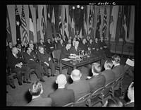 Secretary of State Stettinius and French Ambassador Henri Bonnet on the occasion of the signing the United Nations declaration for France at the State Department. Sourced from the Library of Congress.