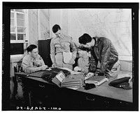 Pilots of the United States Army air transport command in discussion. Sourced from the Library of Congress.
