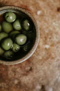 Fresh organic olives in a bowl