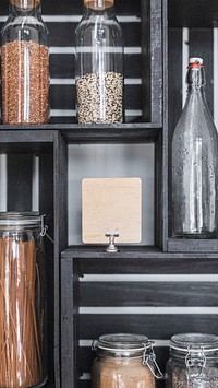 Dry grains in containers on a shelf mobile phone wallpaper