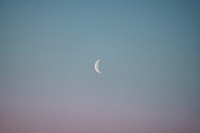 Crescent moon on  pastel sky