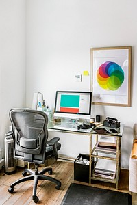 Computer on a wooden table in a home office