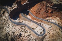 Drone shot of a desert curve road
