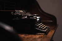 Old typewriter on a wooden table