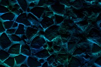 Glowing dark blue dried color powder texture background