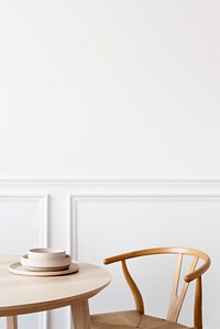 Clean and minimal dining room table with chair