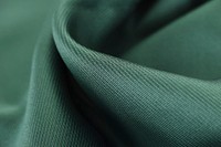 Free dark green polyester image, public domain fabric CC0 photo.