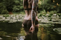 Free woman body in water, public domain person CC0 photo.