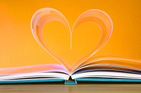 Free open book with heart shaped pages photo, public domain CC0 image.