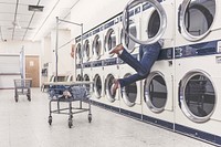 Free person in washing machine in self service laundry room image, public domain CC0 photo.