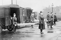 St. Louis Red Cross Motor Corps on duty during influenza epidemic (1918). Original from Library of Congress. Digitally enhanced by rawpixel.