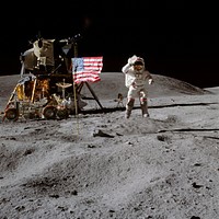 Astronaut John W. Young, commander of the Apollo 16 lunar landing mission, leaps from the lunar surface as he salutes the United States flag at the Descartes landing site during the first Apollo 16 extravehicular activity (EVA). (21 April 1972) Original from NASA. Digitally enhanced by rawpixel.