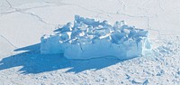An iceberg embedded in sea ice as seen from the IceBridge DC-8 over the Bellingshausen Sea on Oct. 19, 2012. Original from NASA. Digitally enhanced by rawpixel.
