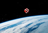 A dice floating in front of one of the windows in the Cupola of the Earth-orbiting International Space Station. Original from NASA. Digitally enhanced by rawpixel.