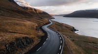 Nature desktop wallpaper background, freeway by the lake on Faroe Islands