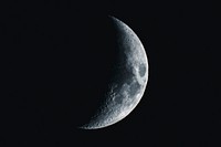 Crescent moon in a black sky