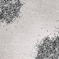 Gray glitter confetti on a silver background 