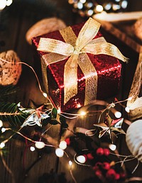 Red present box under a Christmas tree