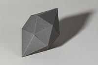 3D gray octahedral polyhedron shaped paper craft on a gray background