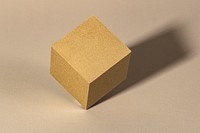 3D golden cubic paper craft on a beige background