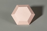 3D pink diamond shaped paper craft on a gray background