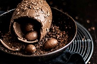 Brown homemade Easter chocolate eggs in a bowl