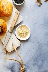 Fresh bread rolls on a cutting board